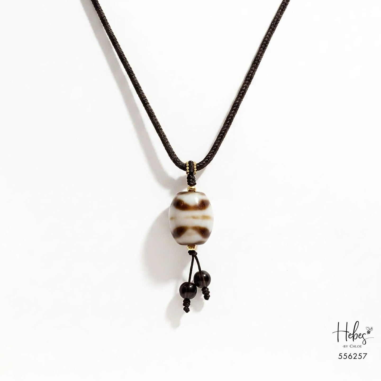 The Strong Tiger Teeth Dzi Pendant 556257